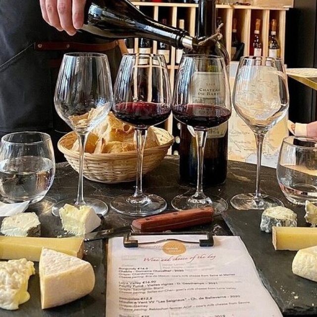 Indulging in fine wine and cheese in France.