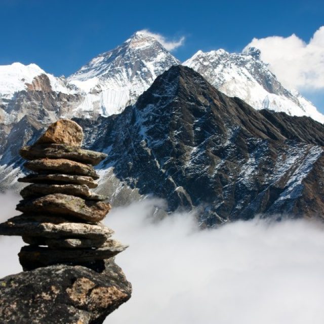 Trekking to breathtaking Himalayan peaks.